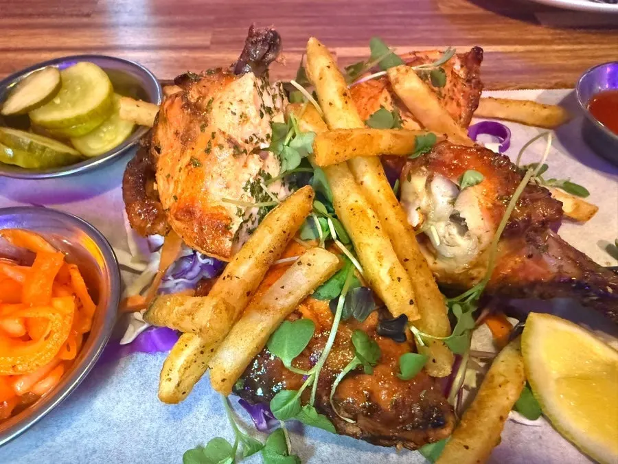 Close-up of golden-brown grilled tandoori chicken