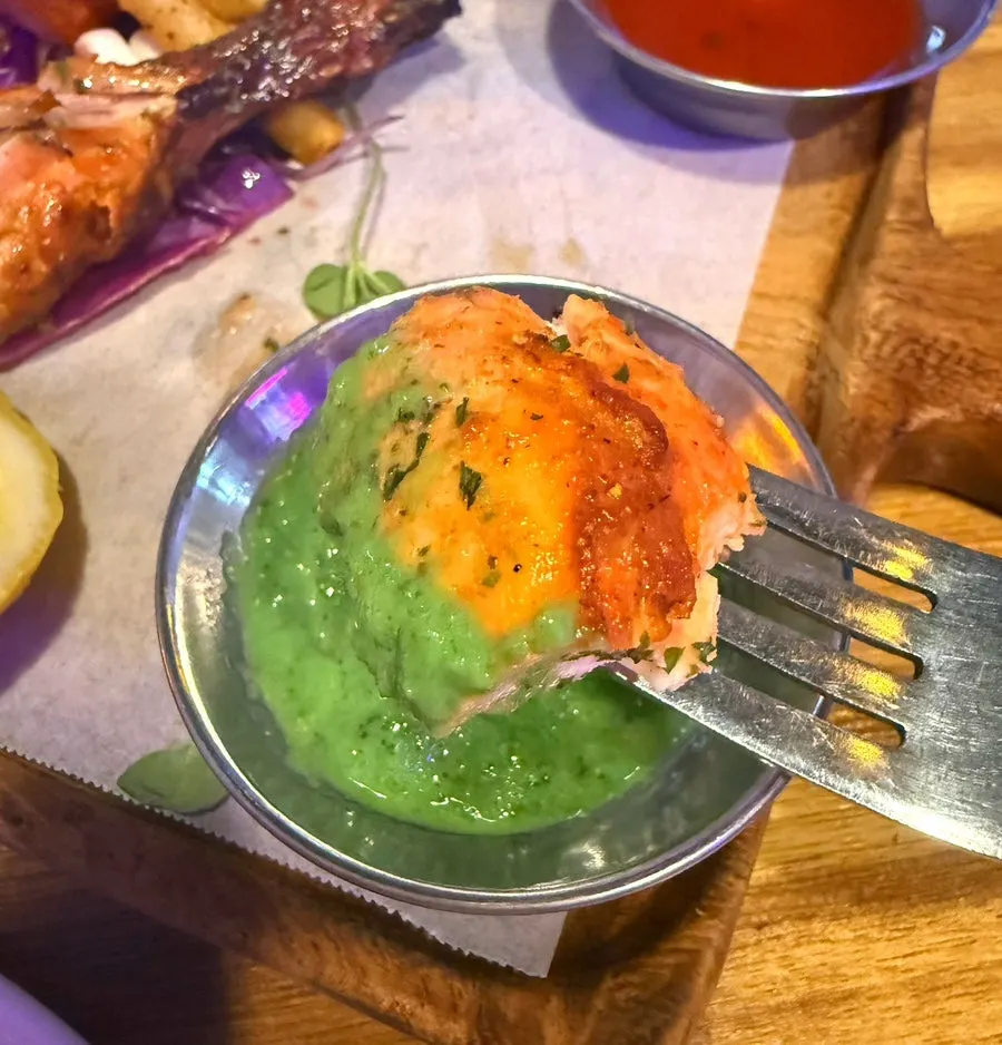 Vegetables served underneath the tandoori chicken