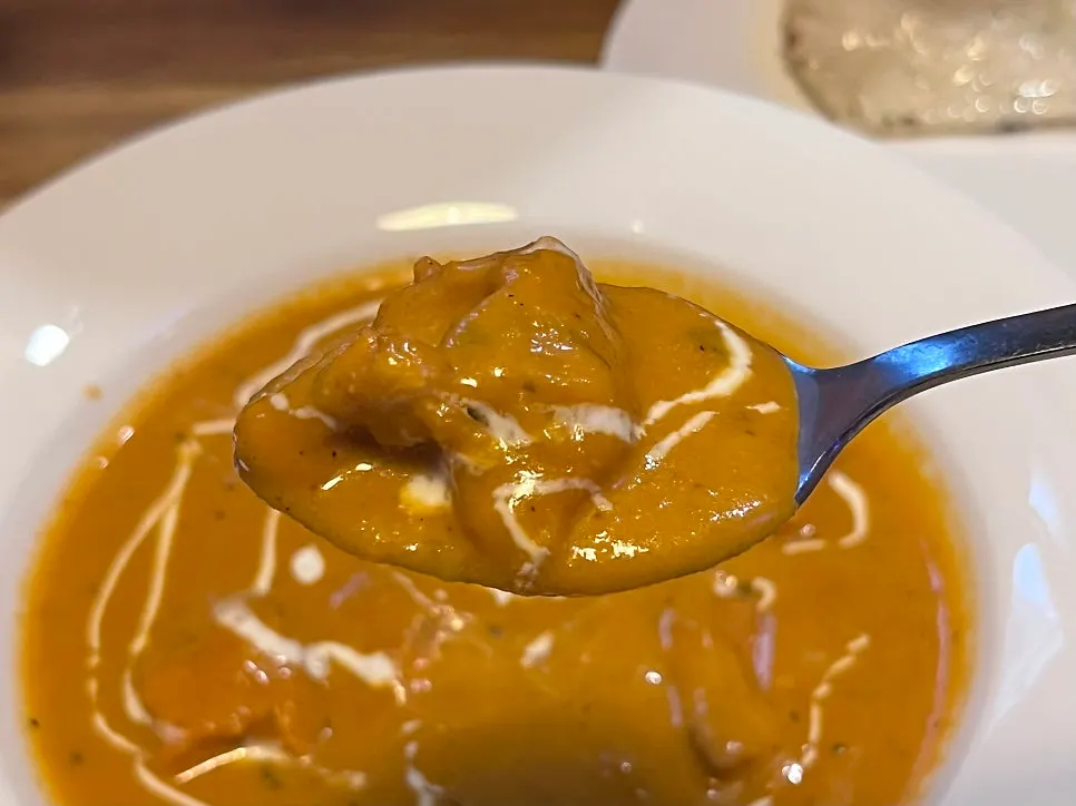 A bowl of creamy chicken makhani curry