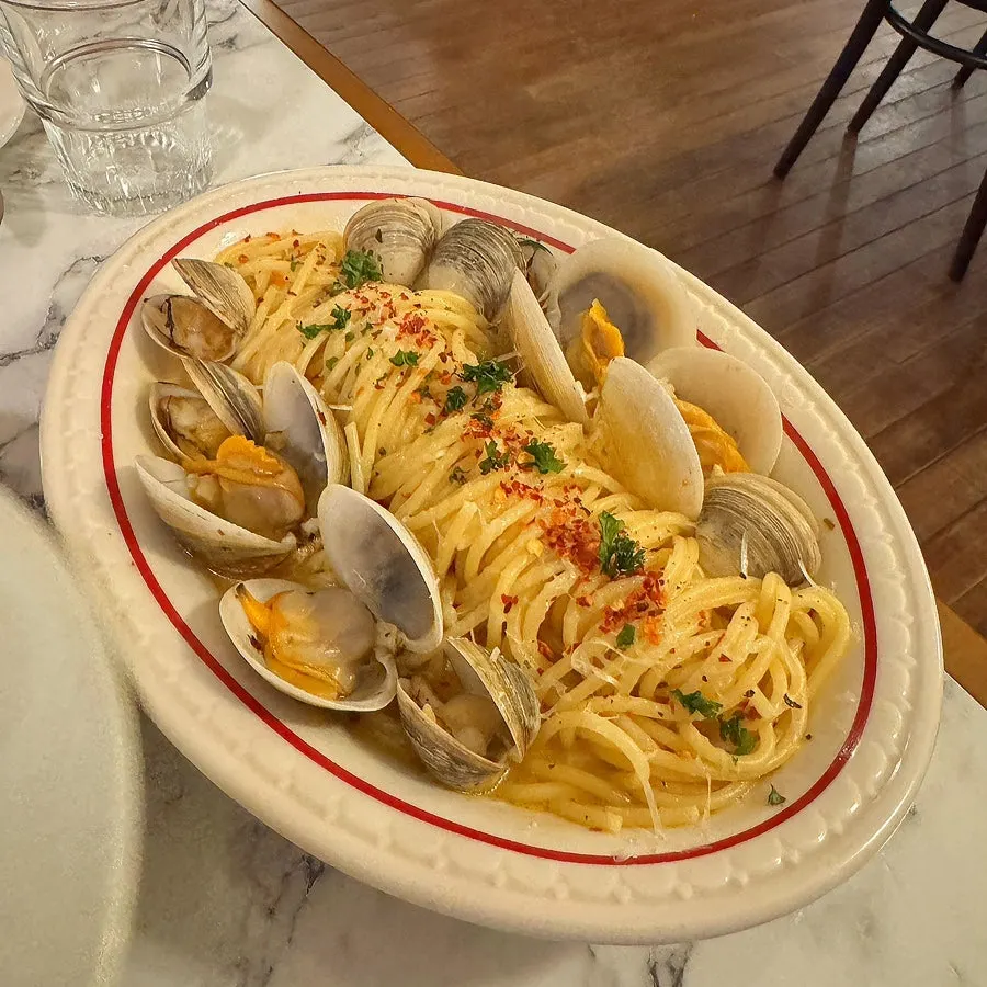 Close-up of vongole pasta topped with clams