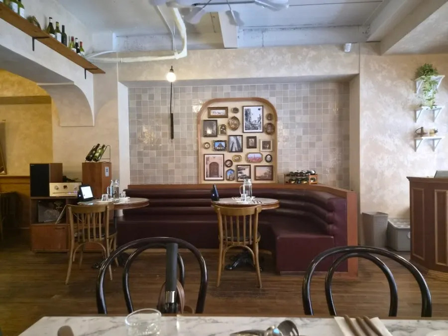 View of the restaurant's atmosphere from a wall-side table