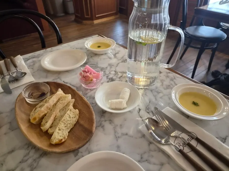 Crisply toasted ciabatta served as pre-meal bread
