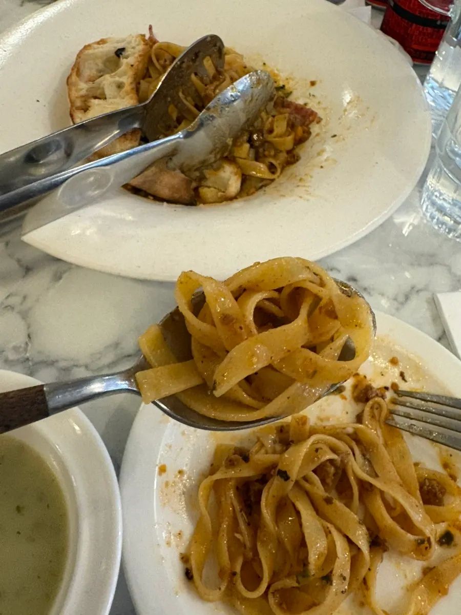 Close-up of the ragu pasta with kalguksu-style noodles