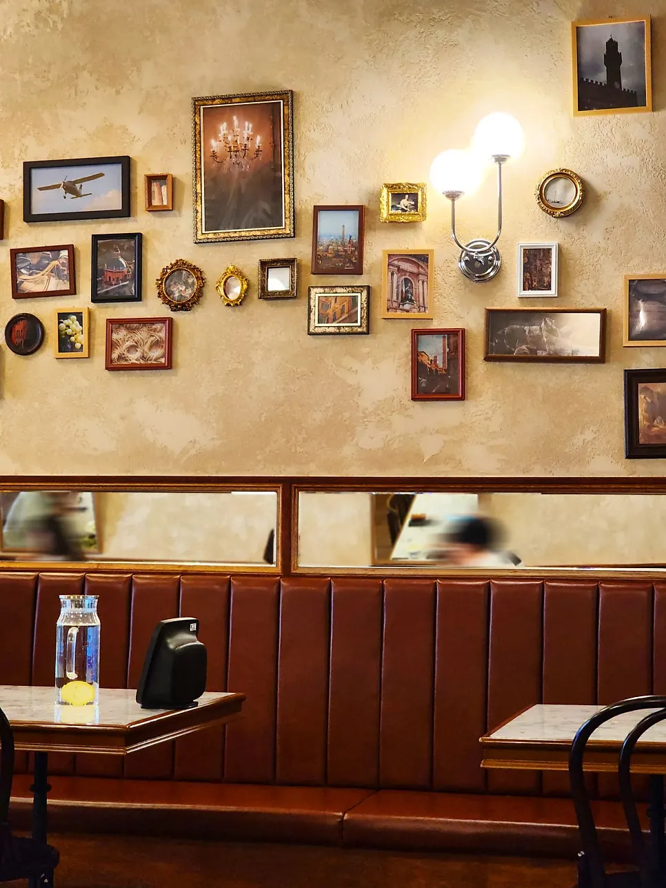 Wine glasses hanging above the counter