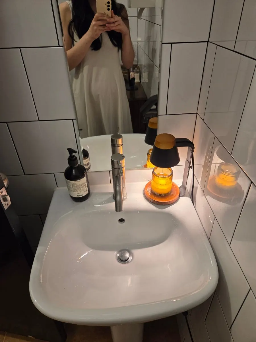 Dyson hair iron provided in the restroom