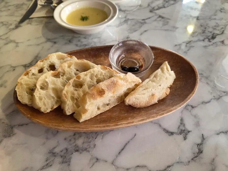 Bread and corn soup served with the gnocchi set