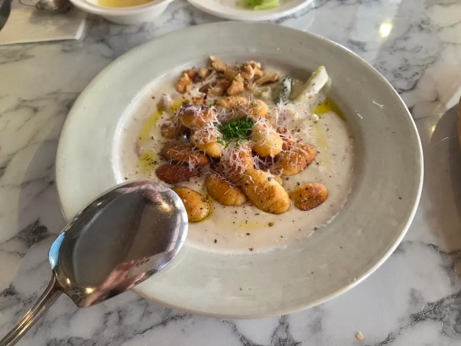 A plate of truffle cream gnocchi
