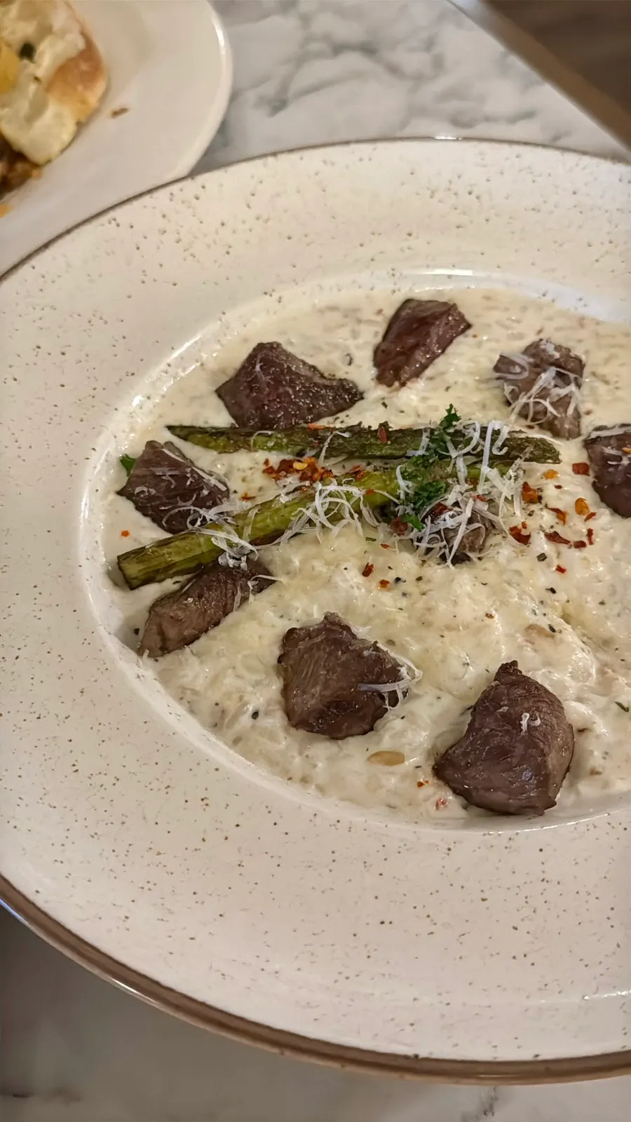 Bolognese ragu pasta and cube steak cream risotto
