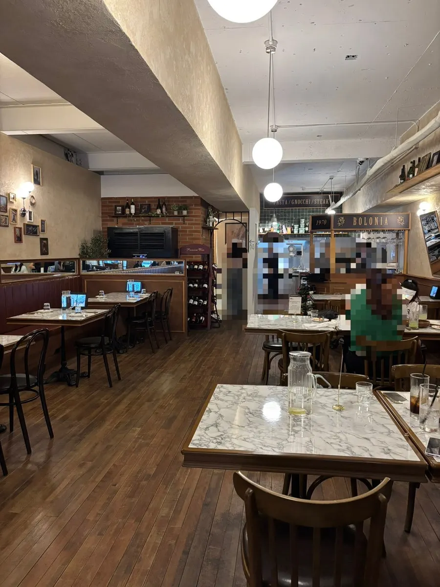 Bologna's tables spaced generously apart