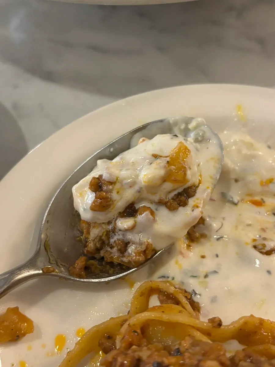 Truffle cream gnocchi topped with walnuts