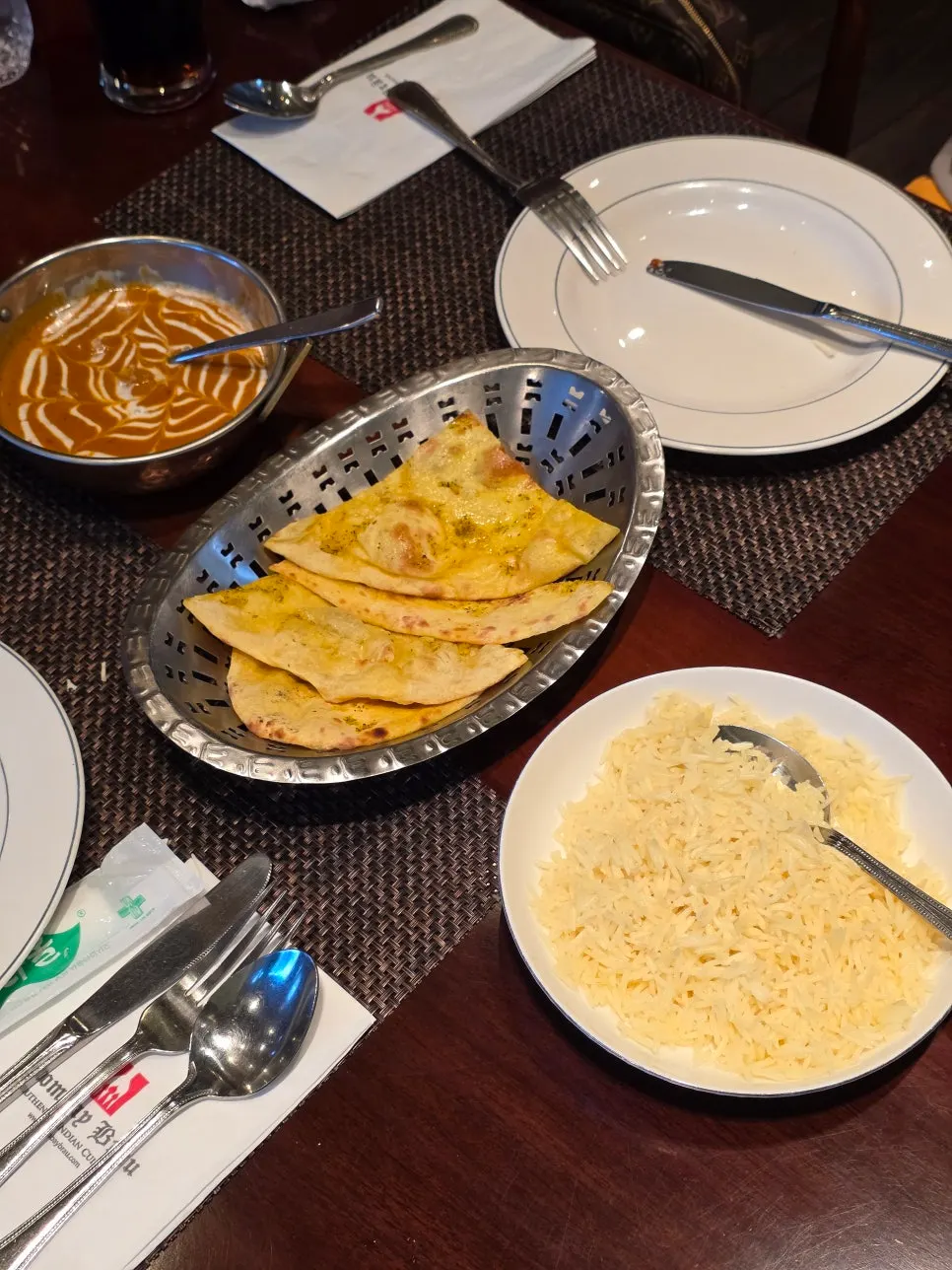 Butter chicken curry with garlic naan