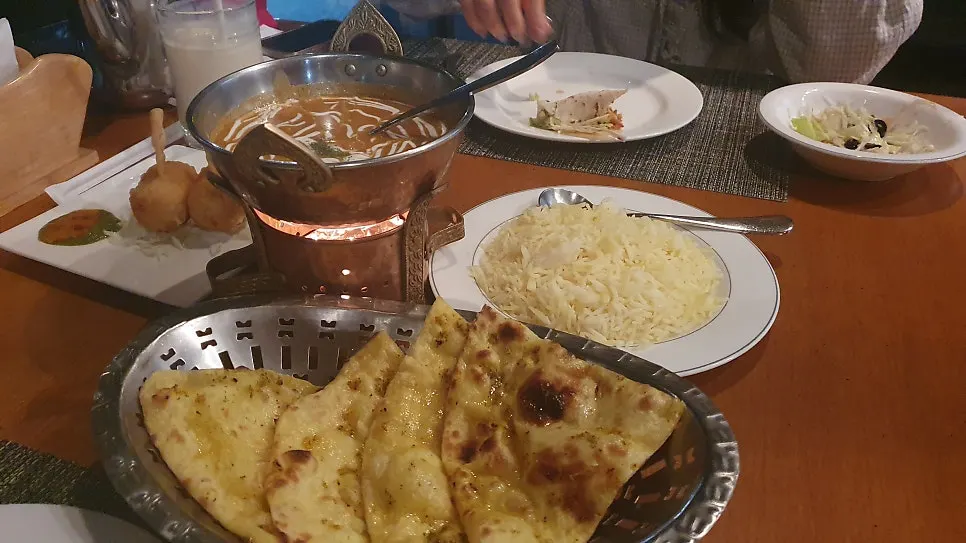 Garlic naan served pre-cut