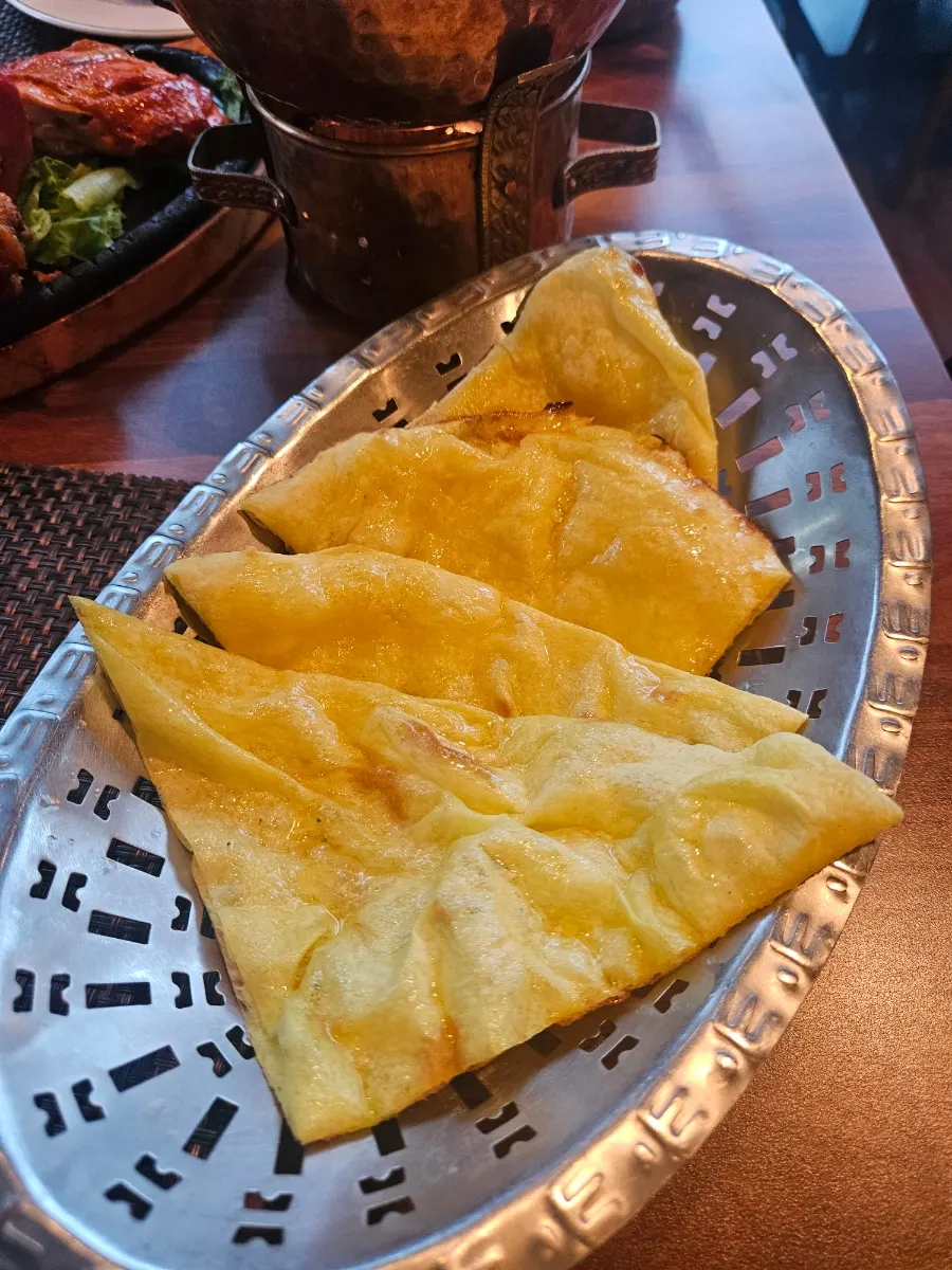 Menu section describing the Afghani chicken