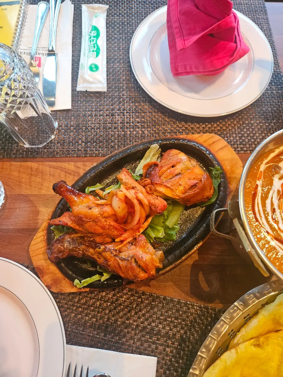 Half a tandoor-roasted tandoori chicken