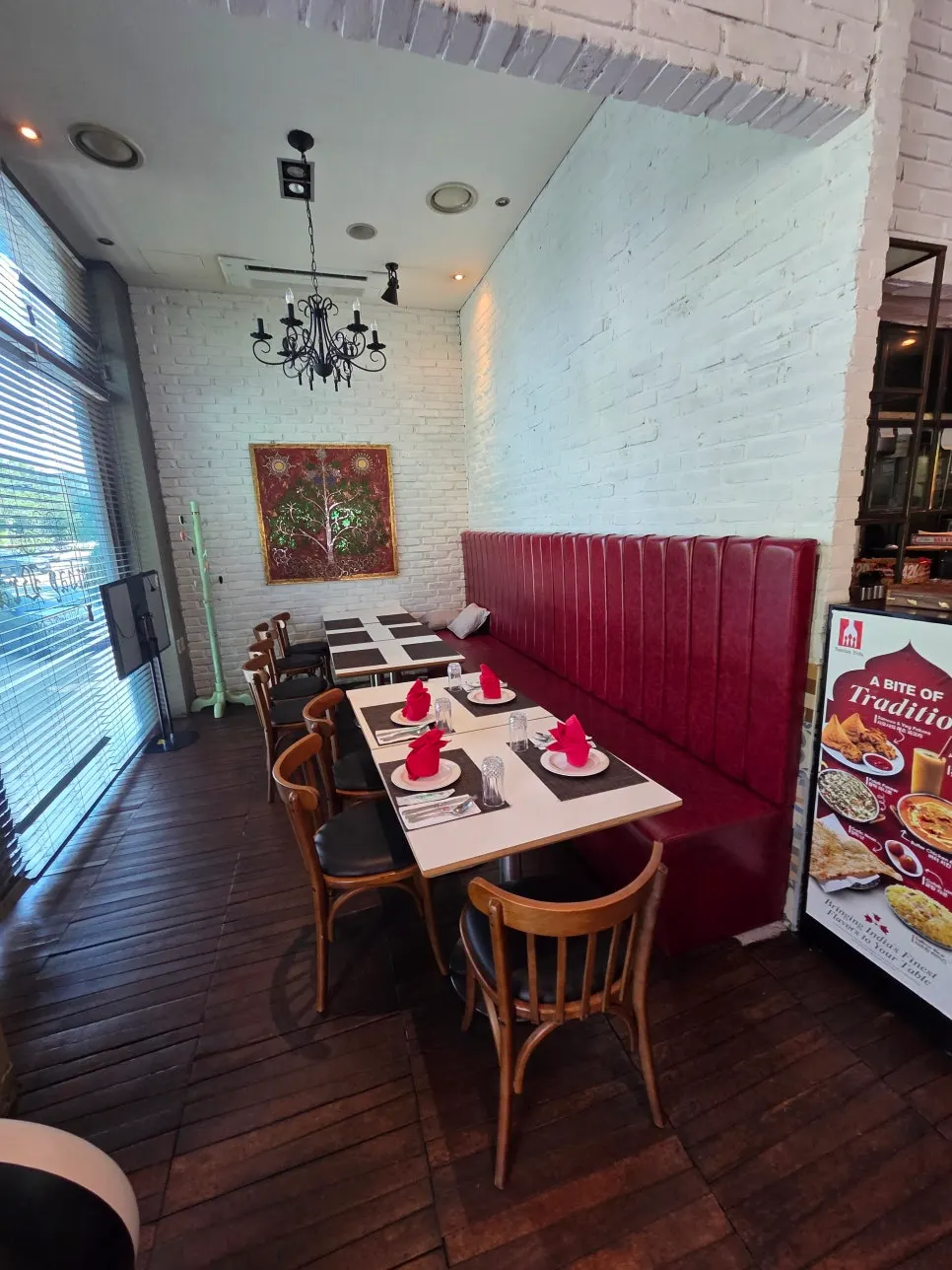 Interior of the Indian restaurant under soft lighting