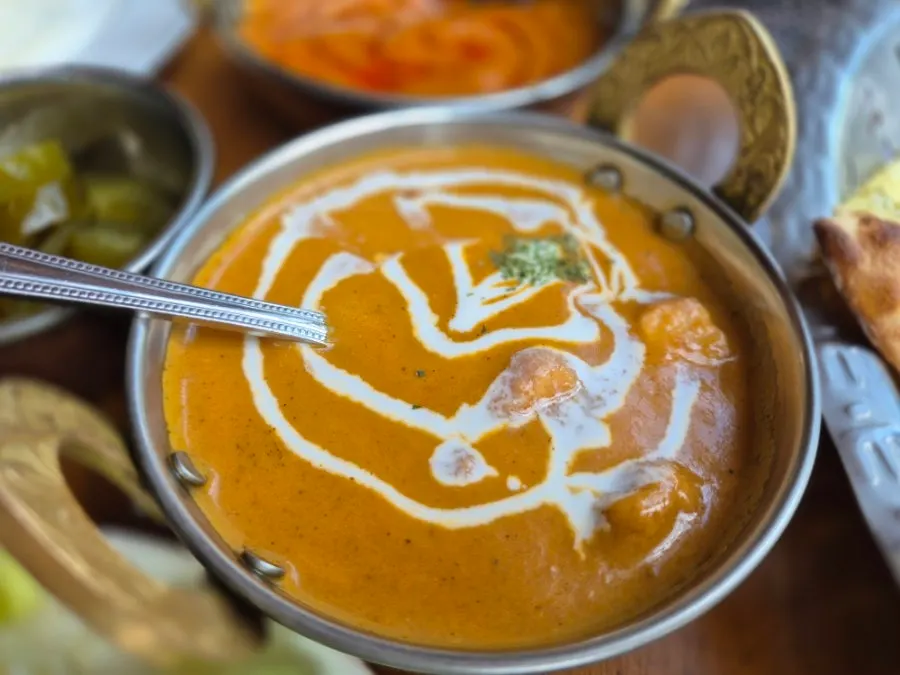 Curry and rice placed together on the table