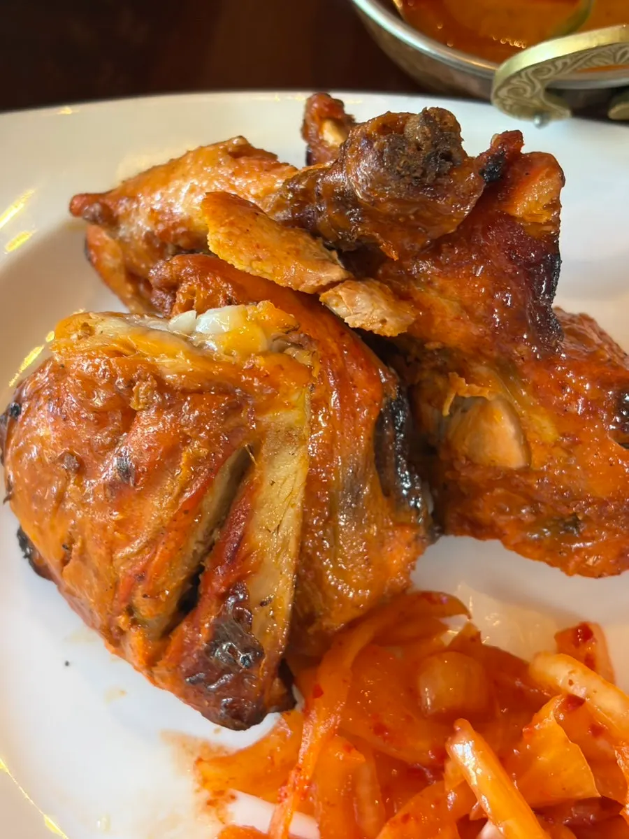 Close-up of smooth butter chicken curry