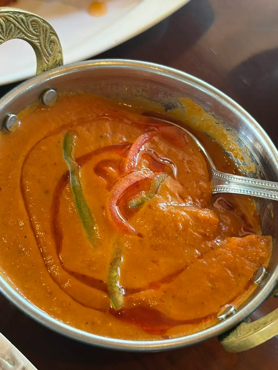 A bowl of chicken tikka masala curry