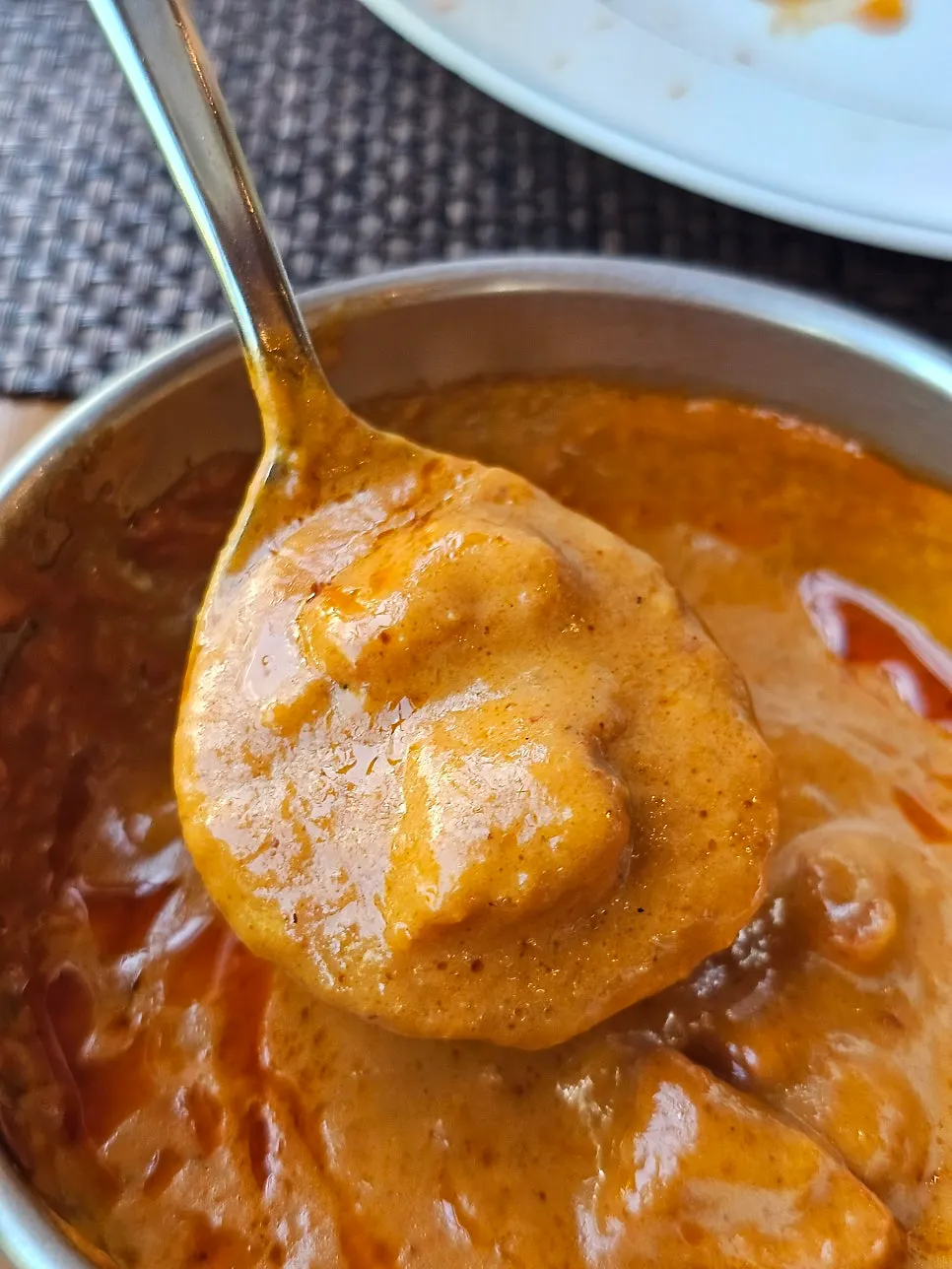 A bowl of chicken tikka masala curry