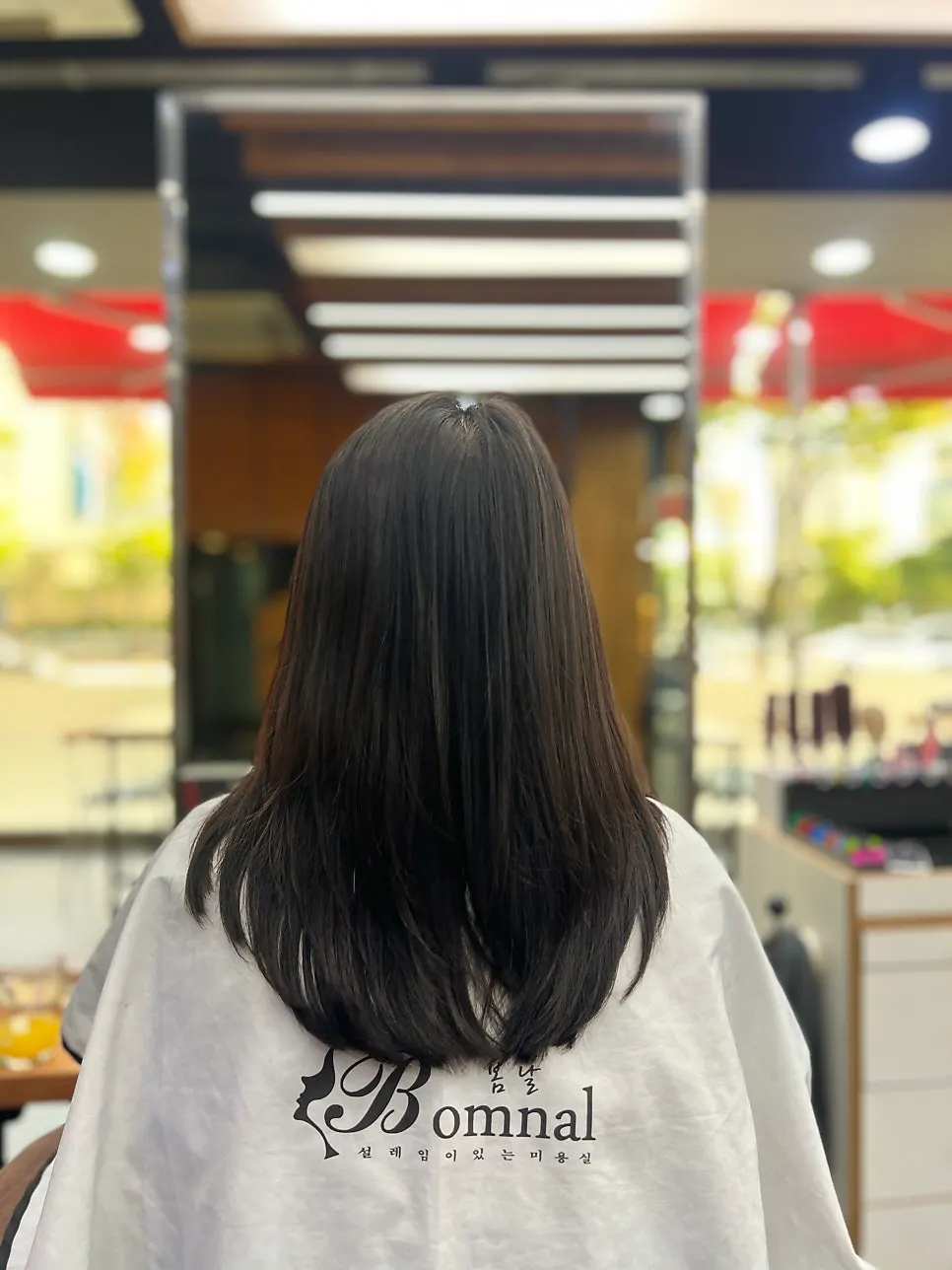 Finished volume perm style on the elementary schooler