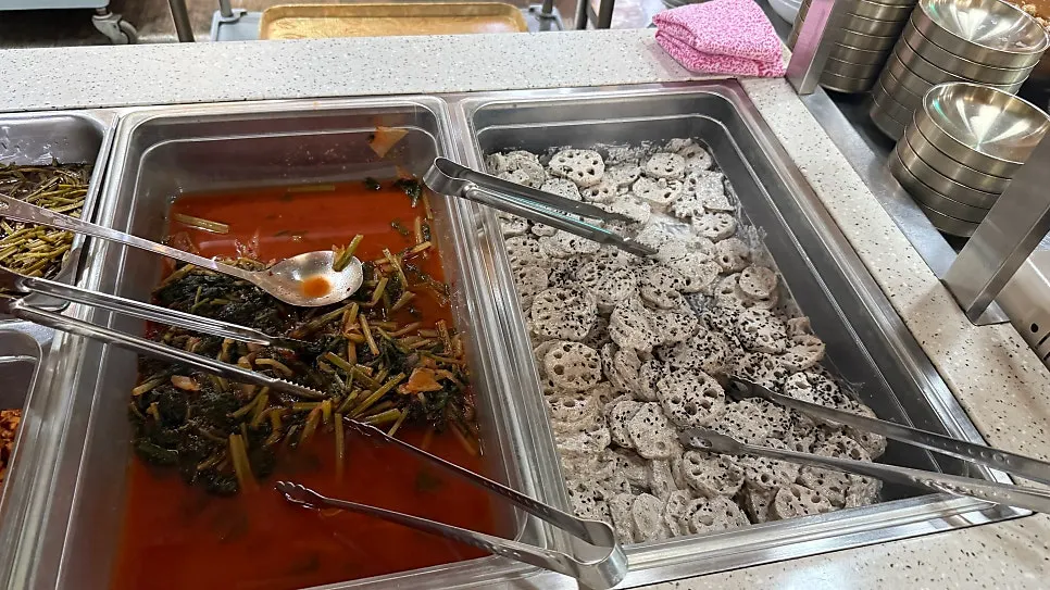 A plate of self-bar banchan brought to the table