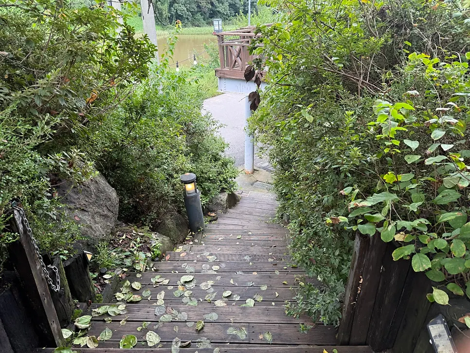 Wooden entrance and welcome sign at Bomseol