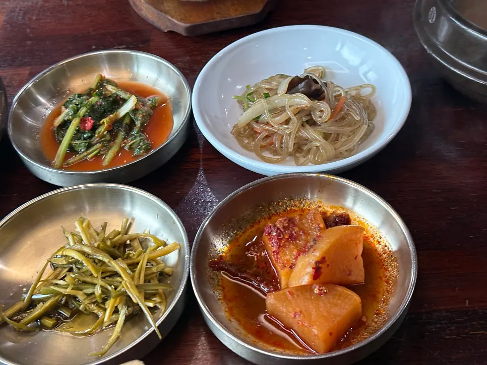 Unlimited banchan self-bar at the center of the restaurant