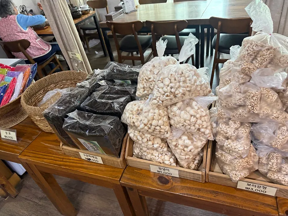 Bags of puffed corn and roasted laver stacked up