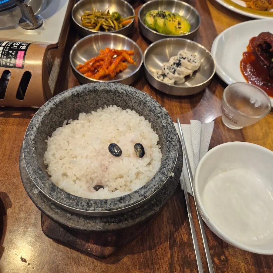 Sticky stone-pot rice transferred to a bowl