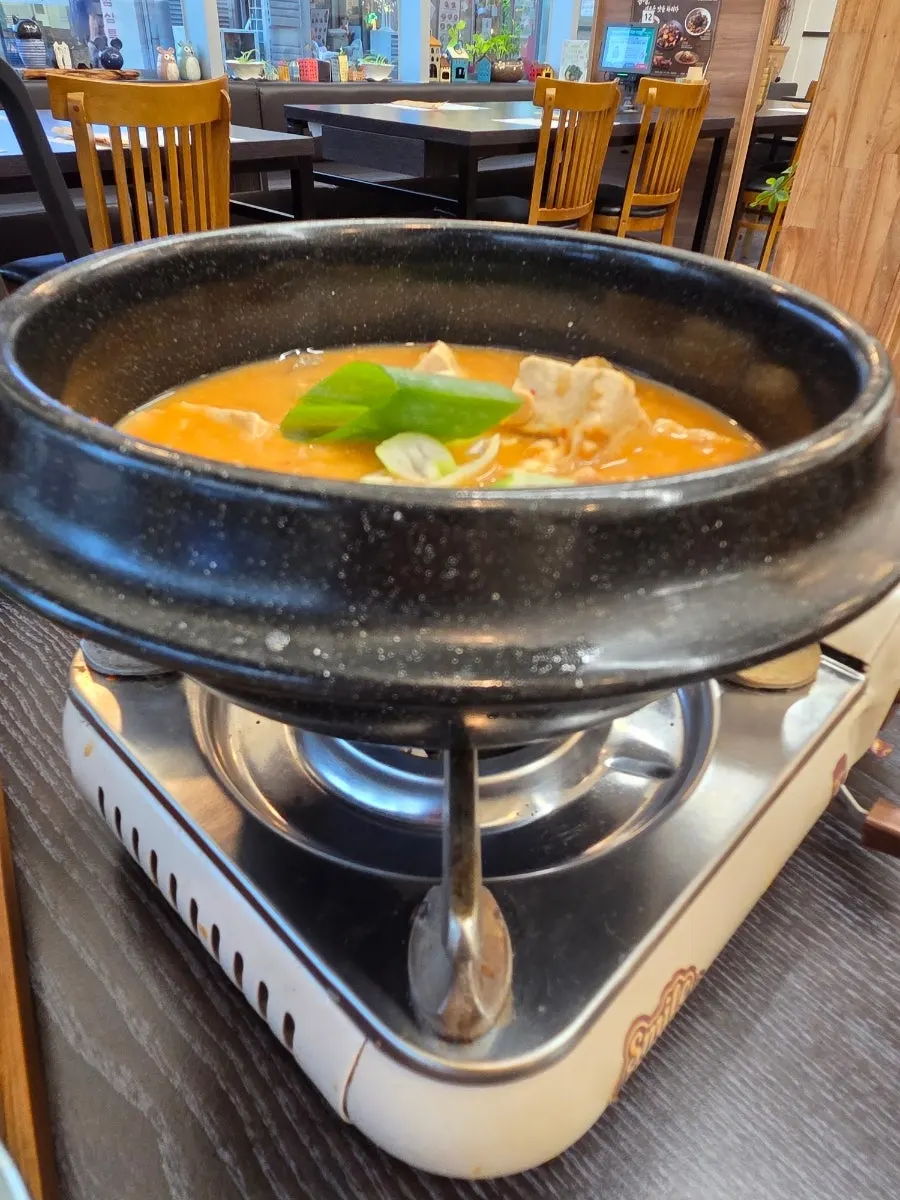 Stone pot rice scooped into a bowl