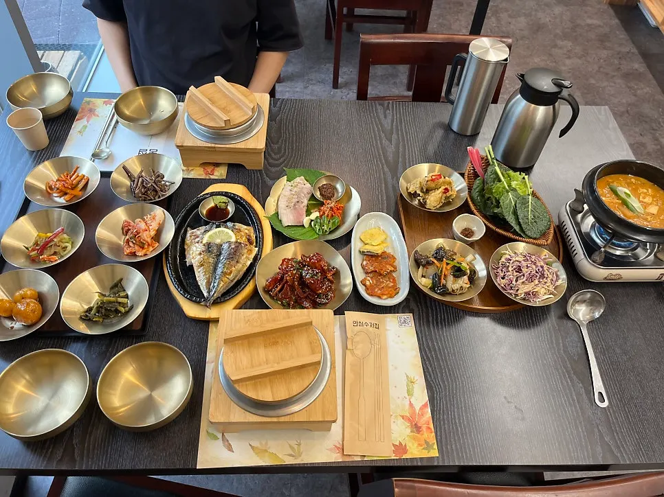 Table filled with side dishes from the Bomseol Han-sang set