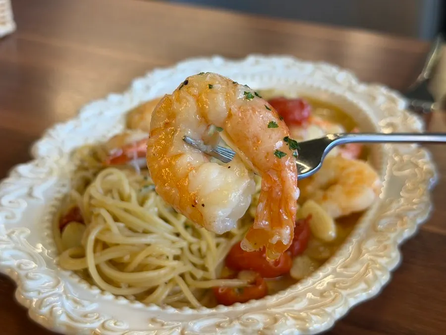 Close-up of pasta showing plump, thick shrimp
