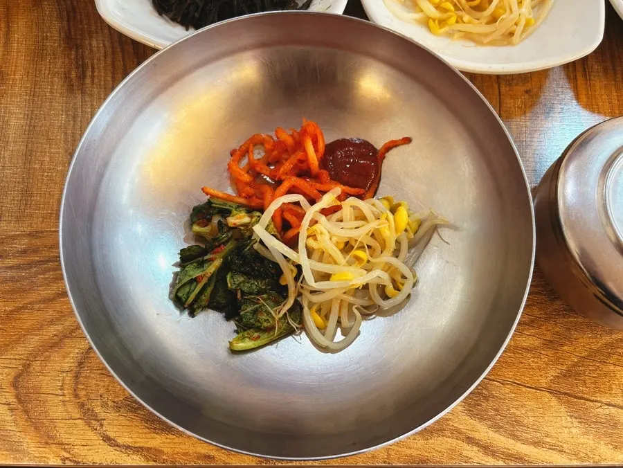 Vegetables from the self-serve corner with leftover rice