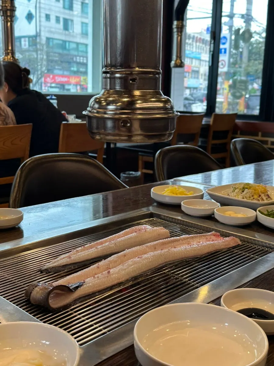 Eel being grilled on the tabletop grill