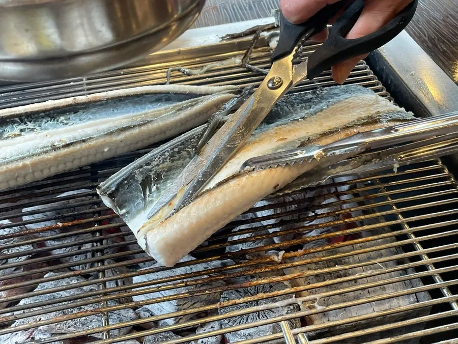 Plump freshwater eel turning golden brown