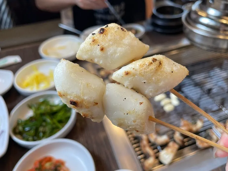 Rice cake skewers grilled at the end of the meal