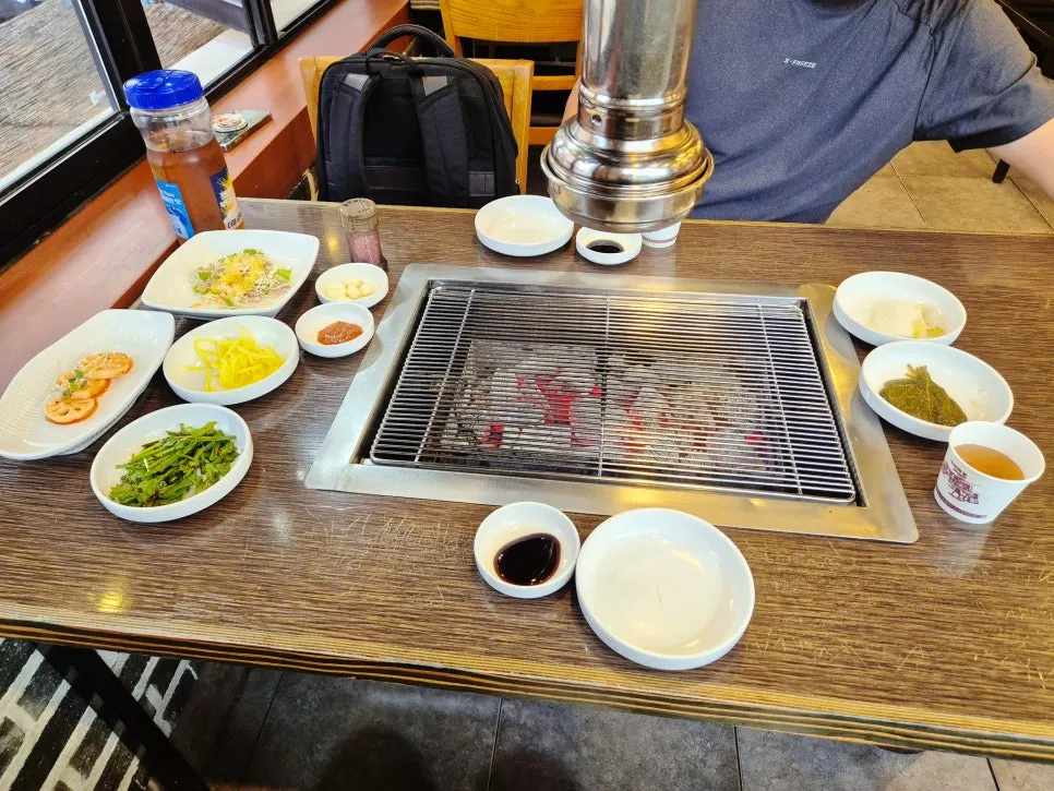 Table set with charcoal and basic side dishes