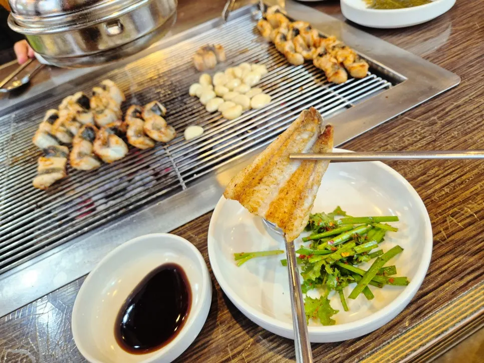 Close-up of grilled eel with rendered fat