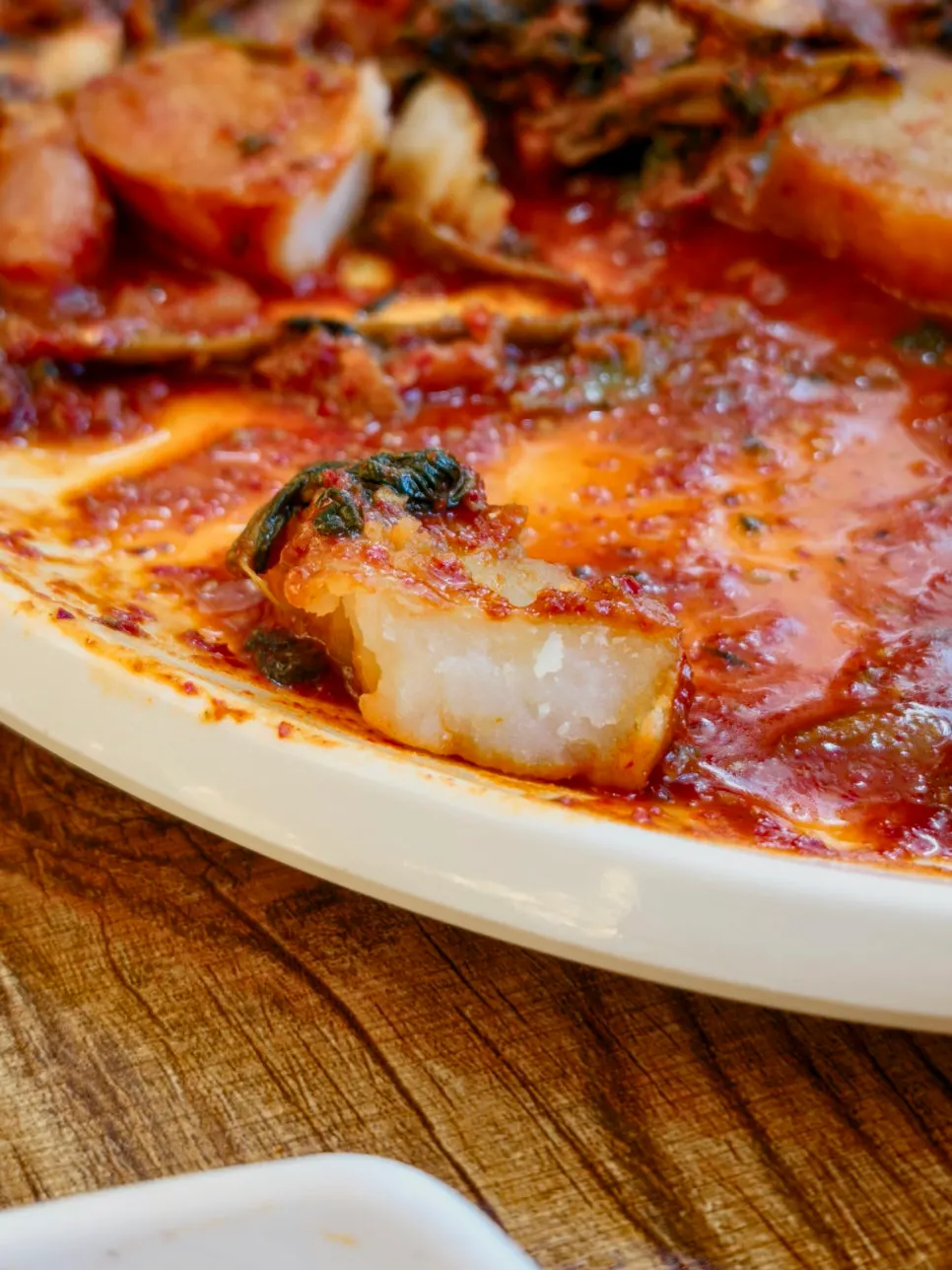 Braised kodari with radish and potato mixed in