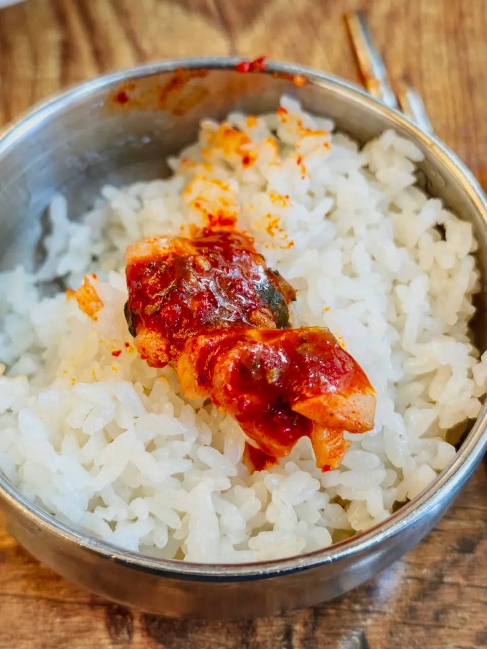 Mixing kodari sauce into rice