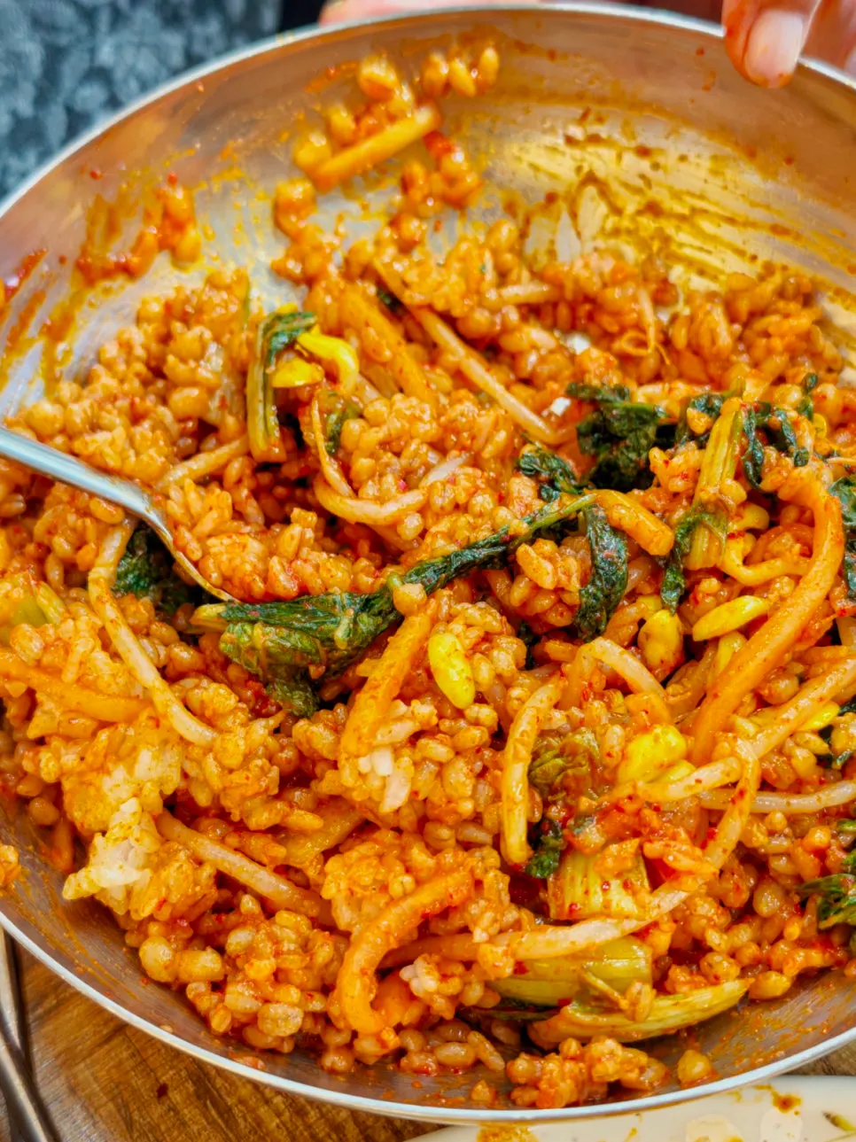 Table with braised kodari and barley rice bibimbap together