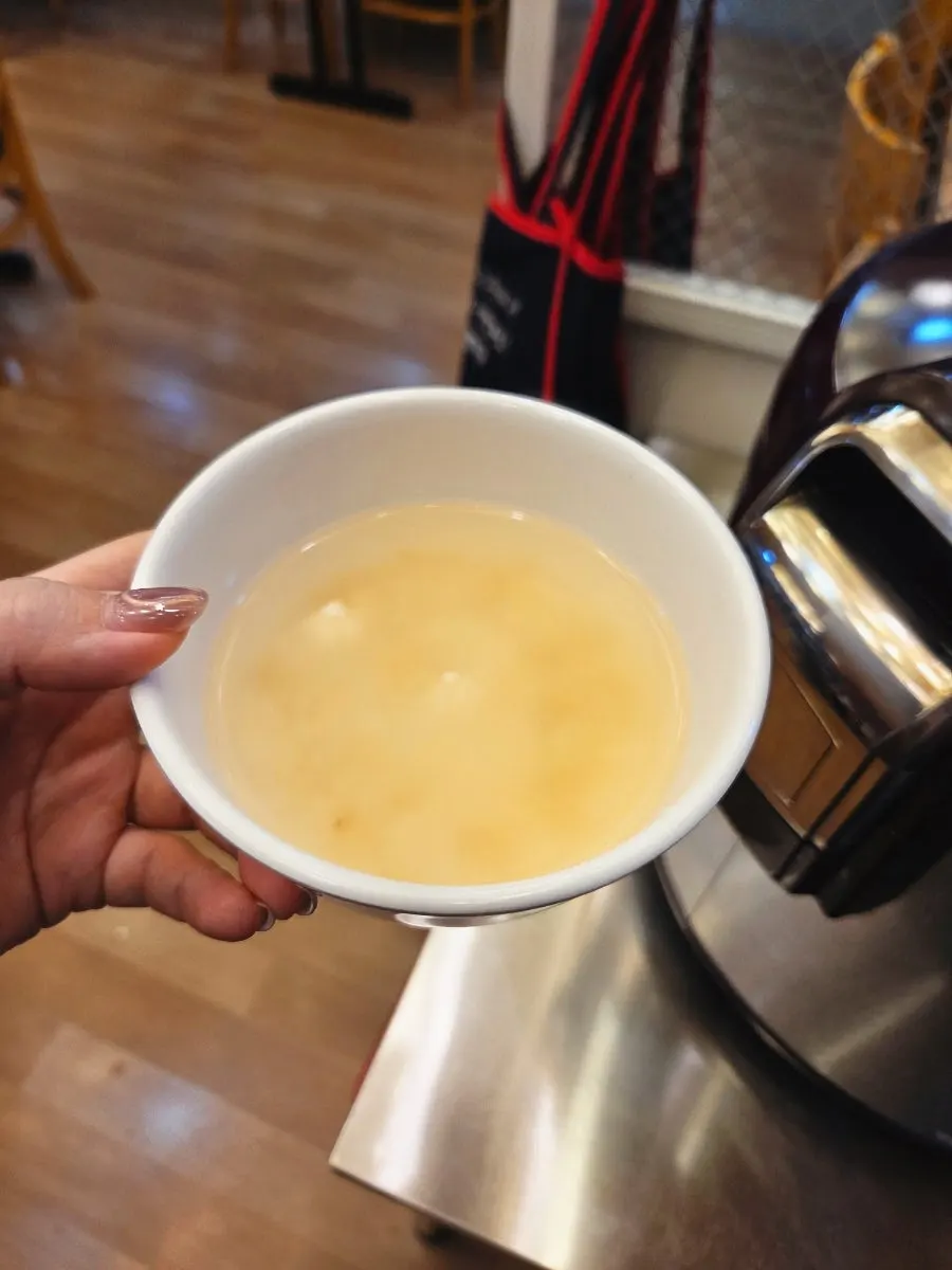 Warm sungnyung prepared at one side of the self-serve bar