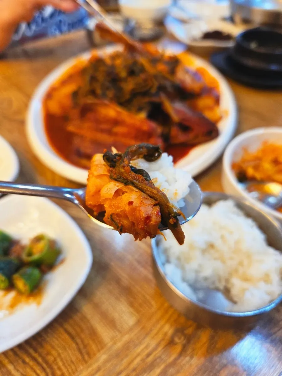 Cross-section of kodari-jorim coated in red sauce