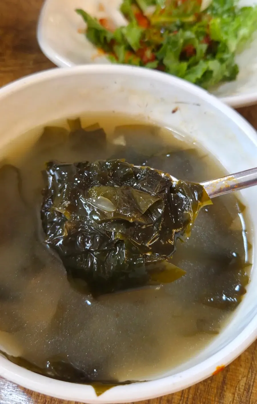 Bowl of milky pollock seaweed soup