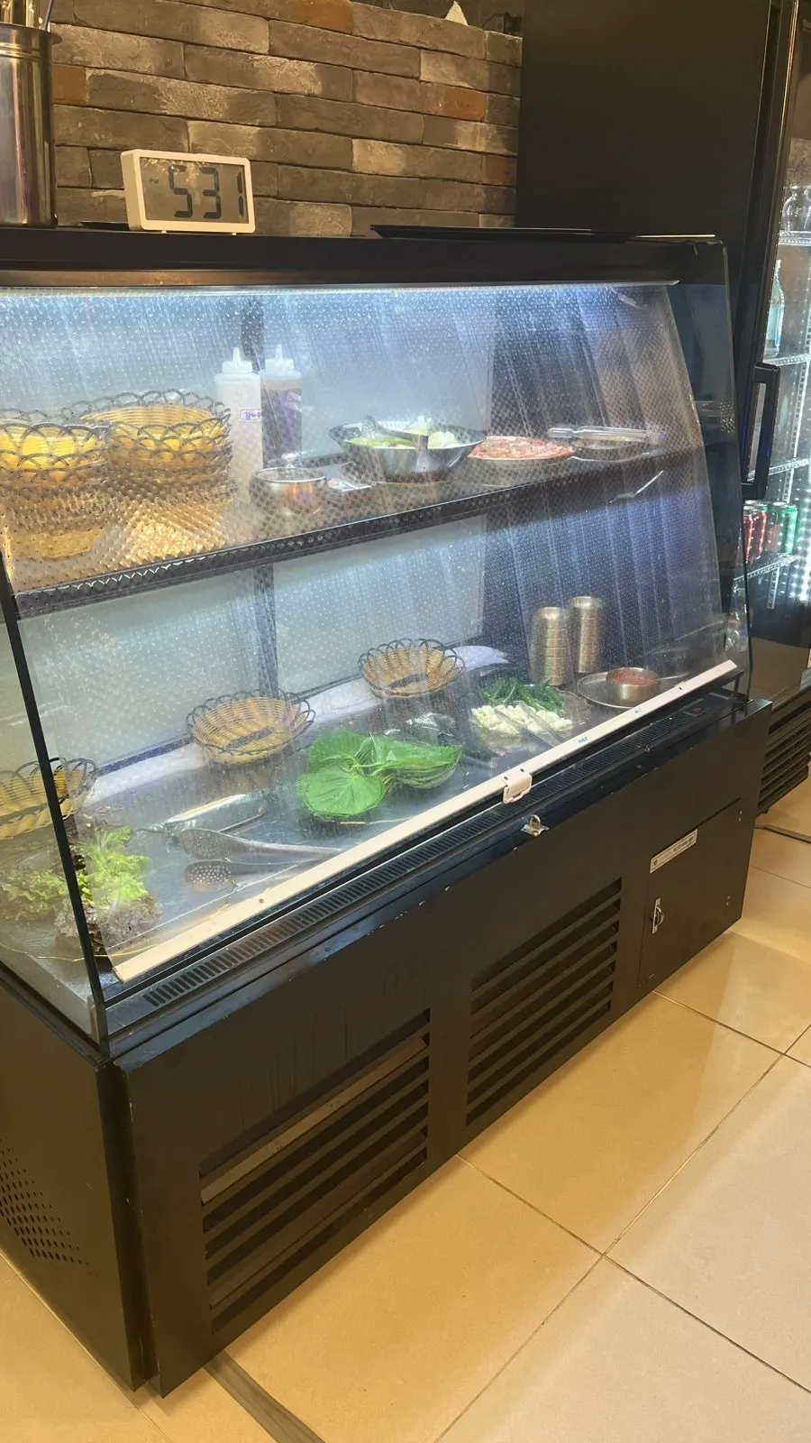 Self-serve corner with a variety of side dishes