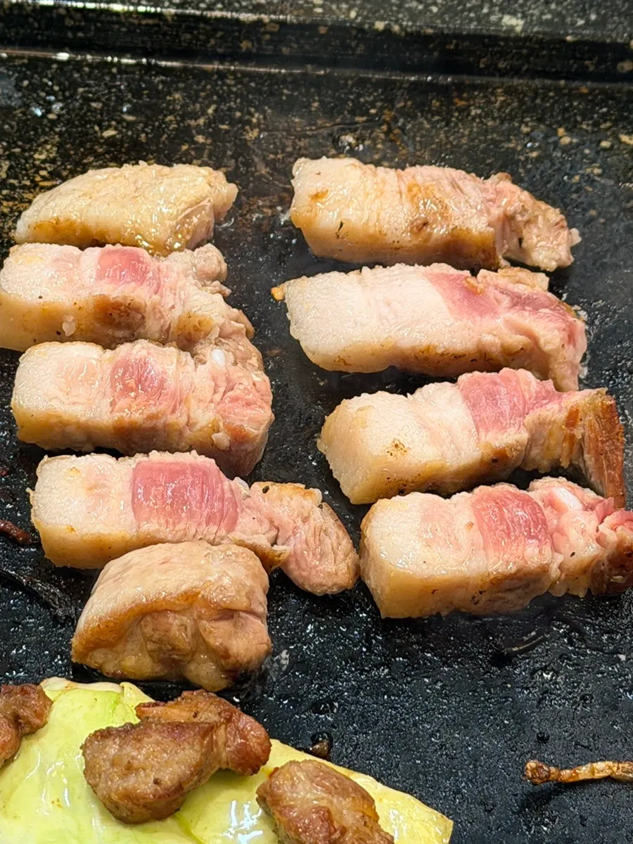 Pork belly and side-dish table setting