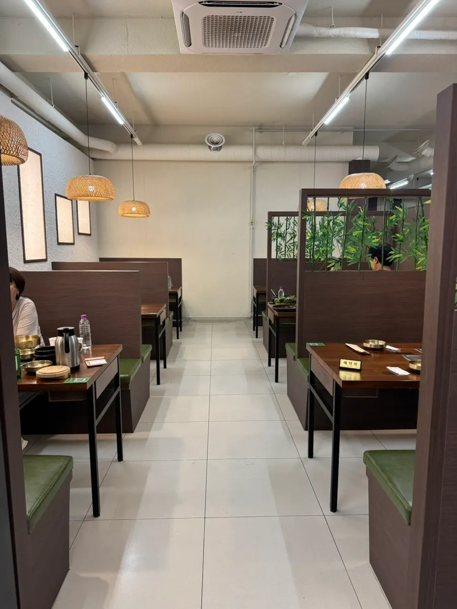 Interior with the phrase 'Grilling with sincerity, serving with heart'