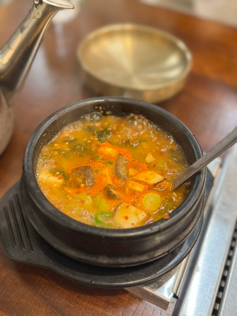 Table setting with doenjang jjigae and miyeokguk