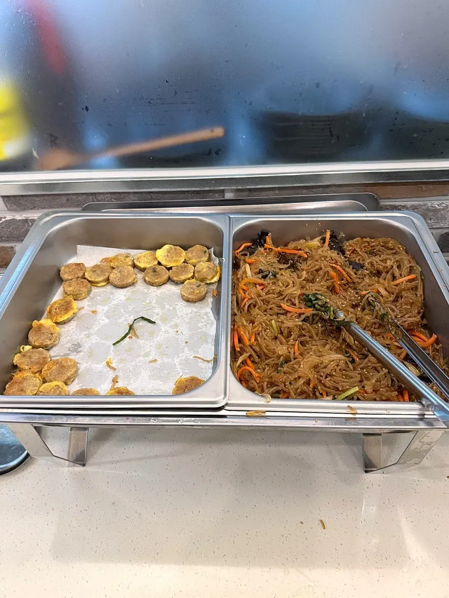 Neatly arranged side dishes at the self-serve bar