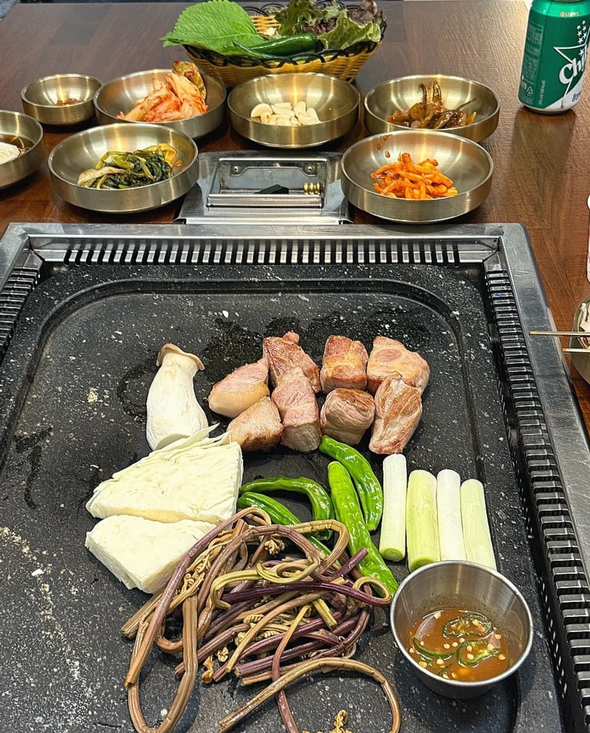 Glistening diced pork neck on the stone plate